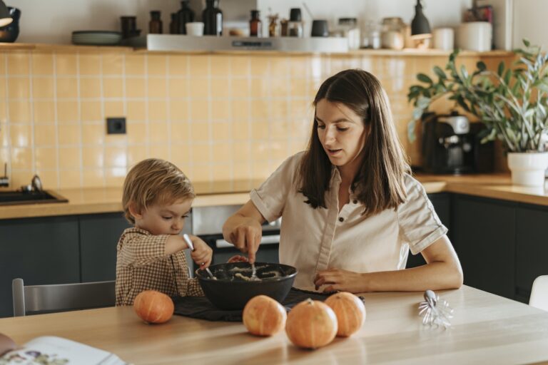 A Mother and Child Mixing a Dough